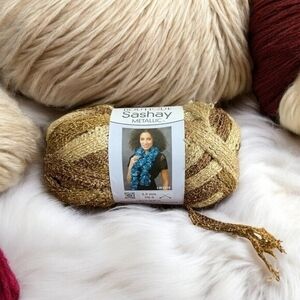 Red Heart Boutique Sashay Boho Yarn Tambourine Gold Metallic Texture NWT